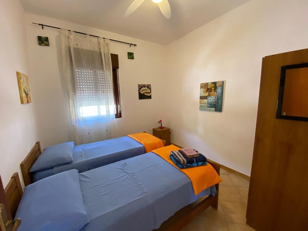 Posteľ alebo postele v izbe v ubytovaní Casa Scala Dei Turchi