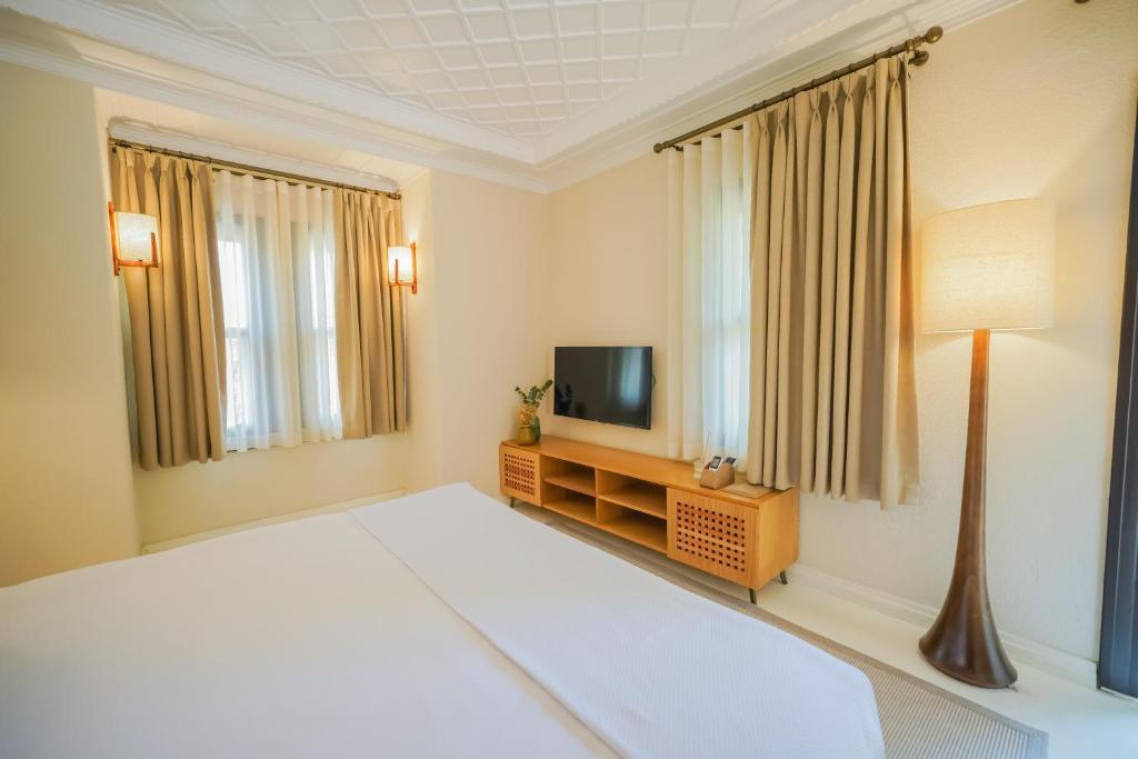 TV a/nebo společenská místnost v ubytování Nuup Hotel