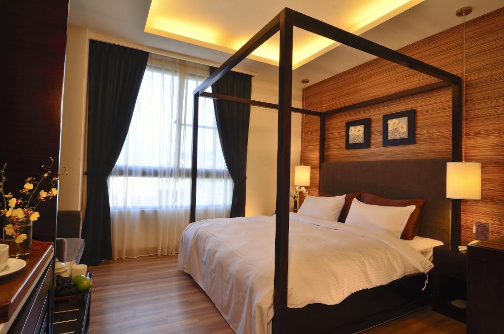 Postel nebo postele na pokoji v ubytování Hotel Modern Puli