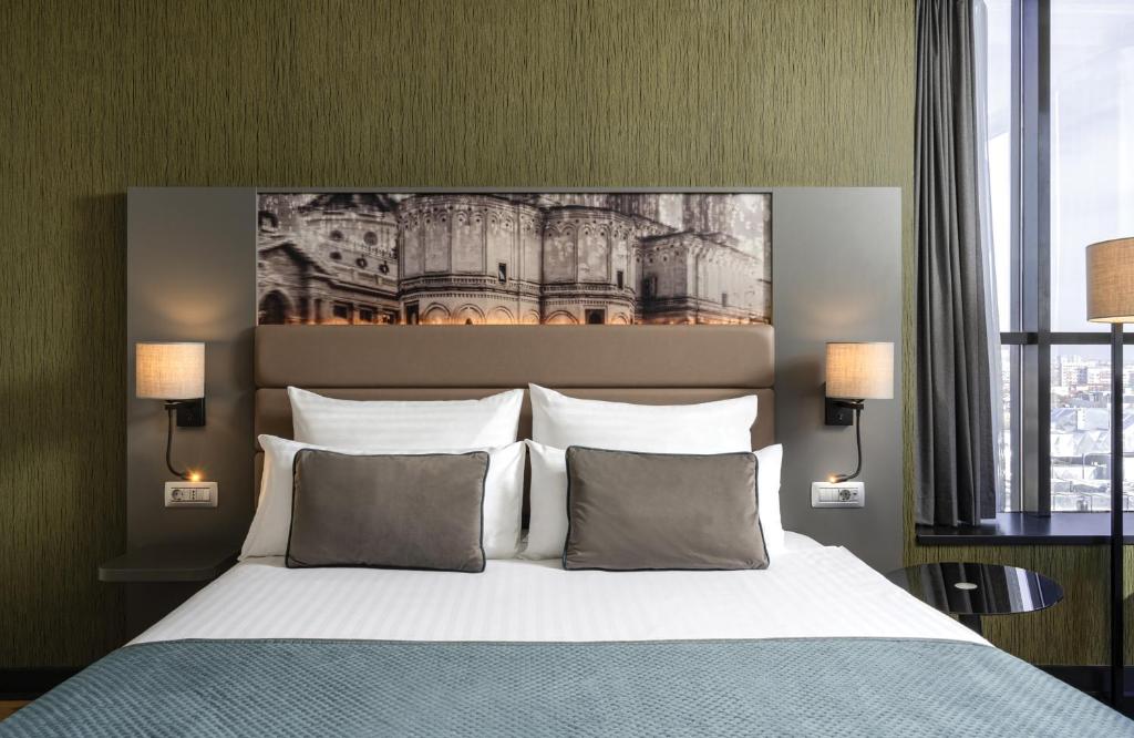 Postel nebo postele na pokoji v ubytování Leonardo Hotel Bucharest City Center