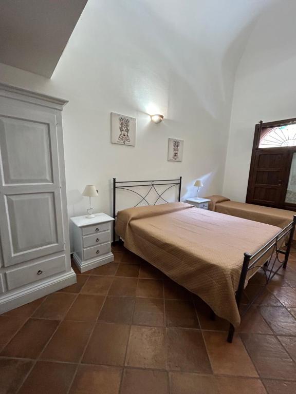 Posteľ alebo postele v izbe v ubytovaní B&B Cinisi Vacanze
