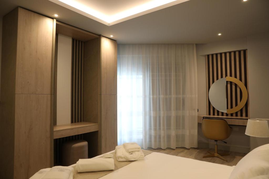 Postel nebo postele na pokoji v ubytování Hotel IMPERIAL