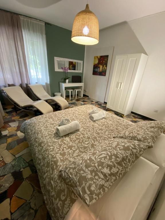 Łóżko lub łóżka w pokoju w obiekcie Delle Rose Rooms