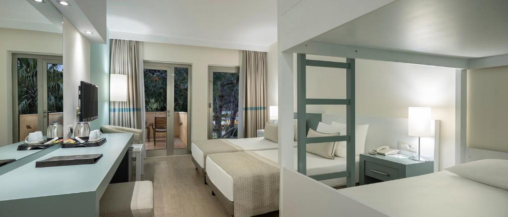 Postel nebo postele na pokoji v ubytování Arcanus Hotels Sorgun - Ultra All Inclusive
