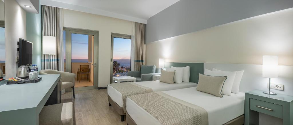 Postel nebo postele na pokoji v ubytování Arcanus Hotels Sorgun - Ultra All Inclusive