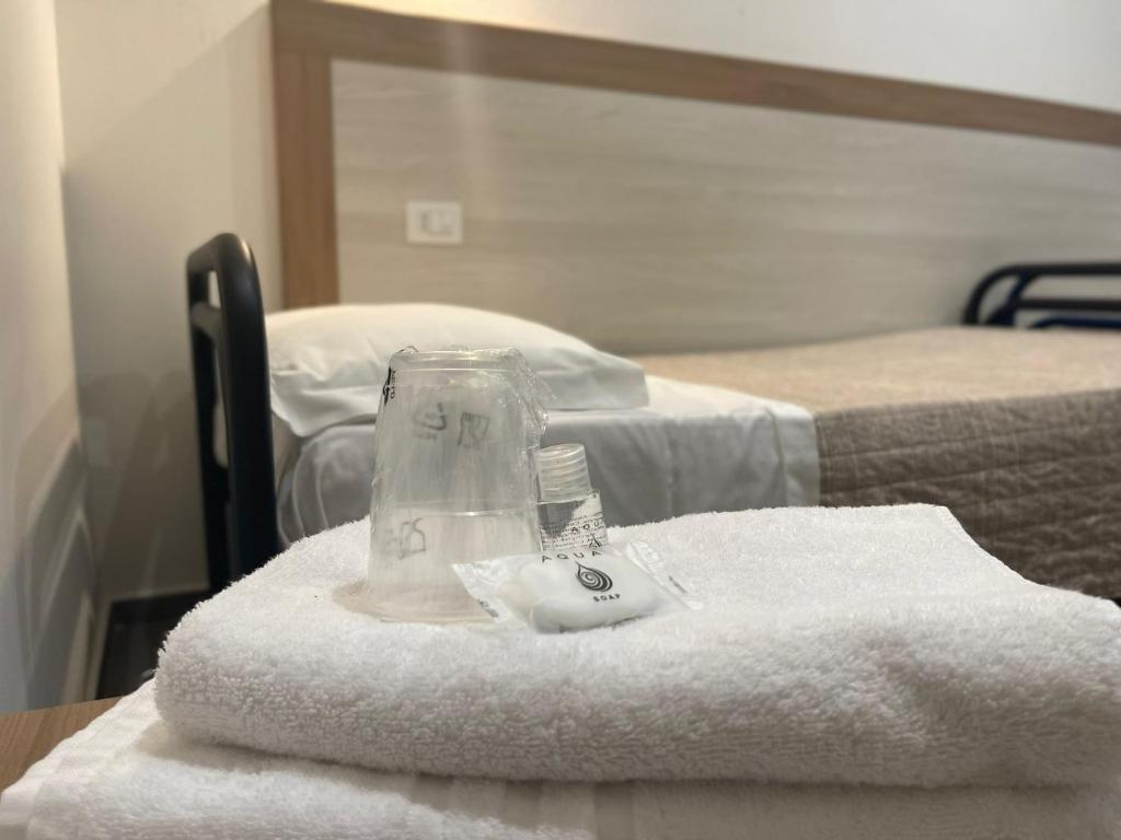 Postel nebo postele na pokoji v ubytování Hotel 26