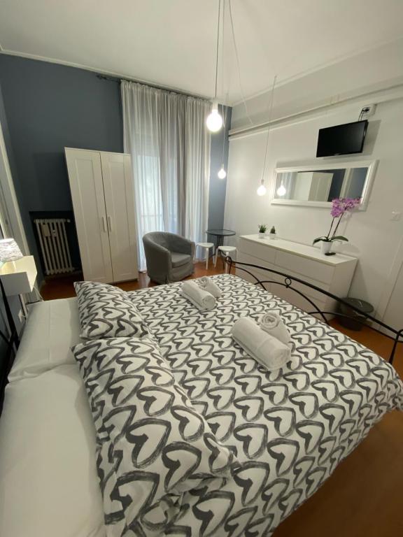 Łóżko lub łóżka w pokoju w obiekcie Delle Rose Rooms