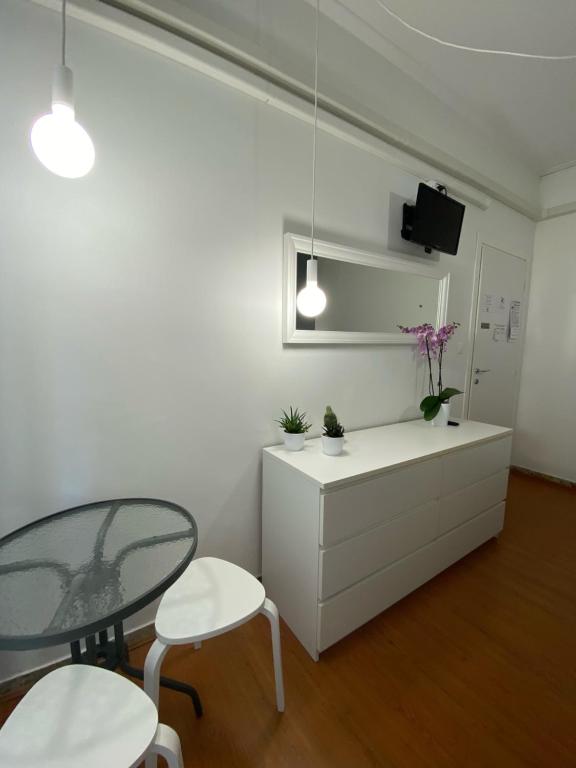 Telewizja i/lub zestaw kina domowego w obiekcie Delle Rose Rooms