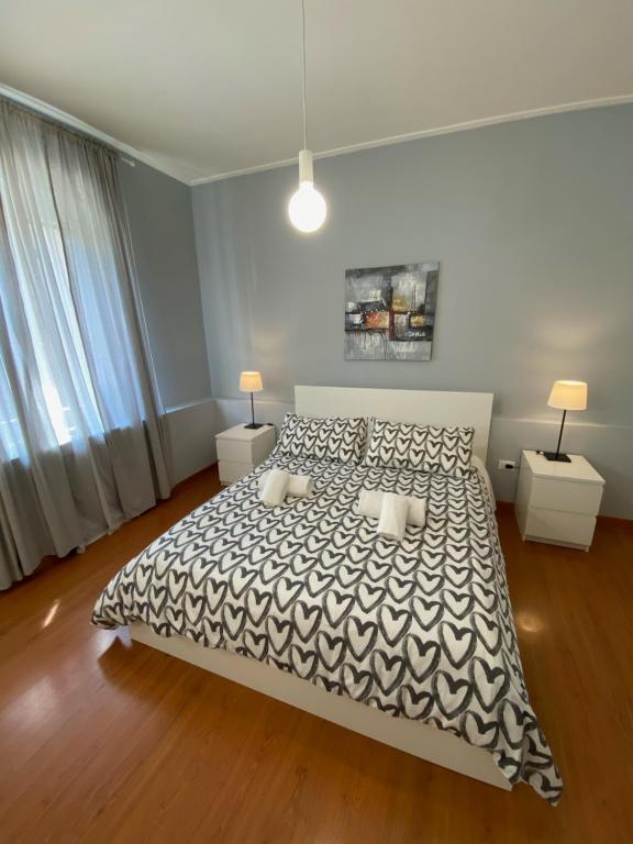 Łóżko lub łóżka w pokoju w obiekcie Delle Rose Rooms