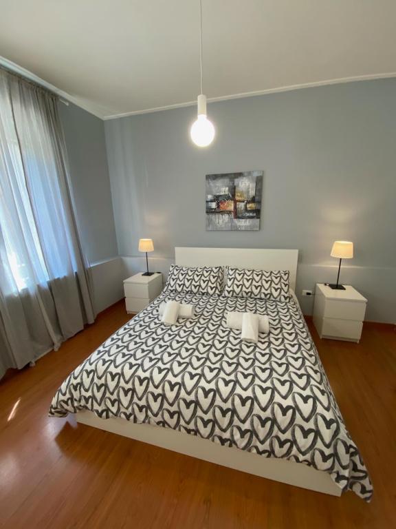 Łóżko lub łóżka w pokoju w obiekcie Delle Rose Rooms