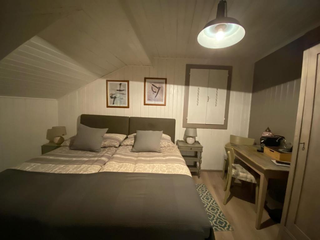 Postel nebo postele na pokoji v ubytování B&B Restaurant Le Pernollet