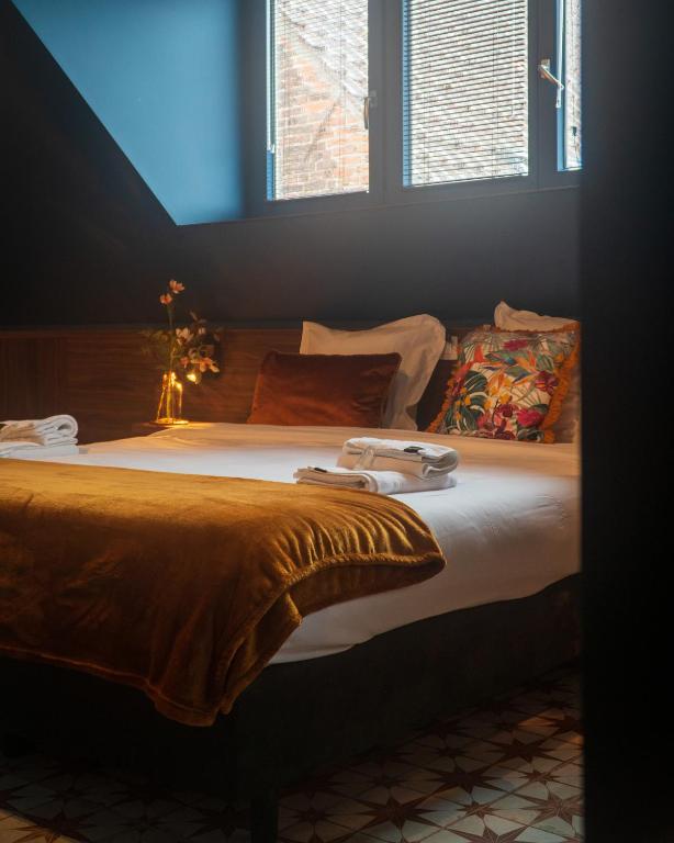 Postel nebo postele na pokoji v ubytování Gran Hotel De Passage