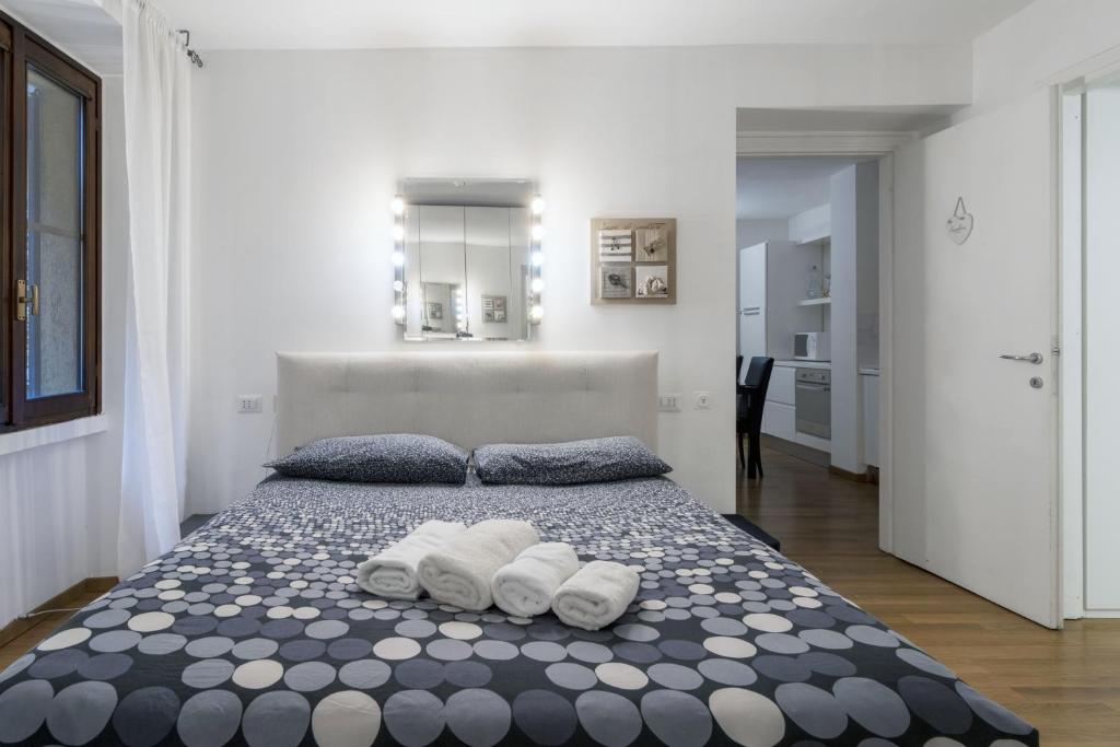 Posteľ alebo postele v izbe v ubytovaní Cozy & comfy apt in Navigli area