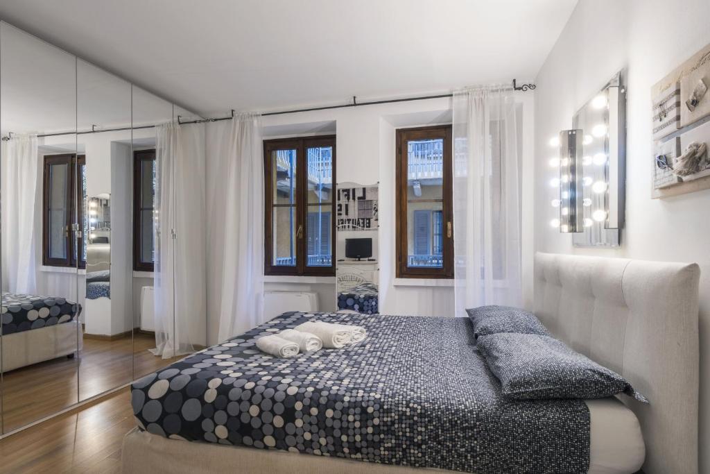 Posteľ alebo postele v izbe v ubytovaní Cozy & comfy apt in Navigli area