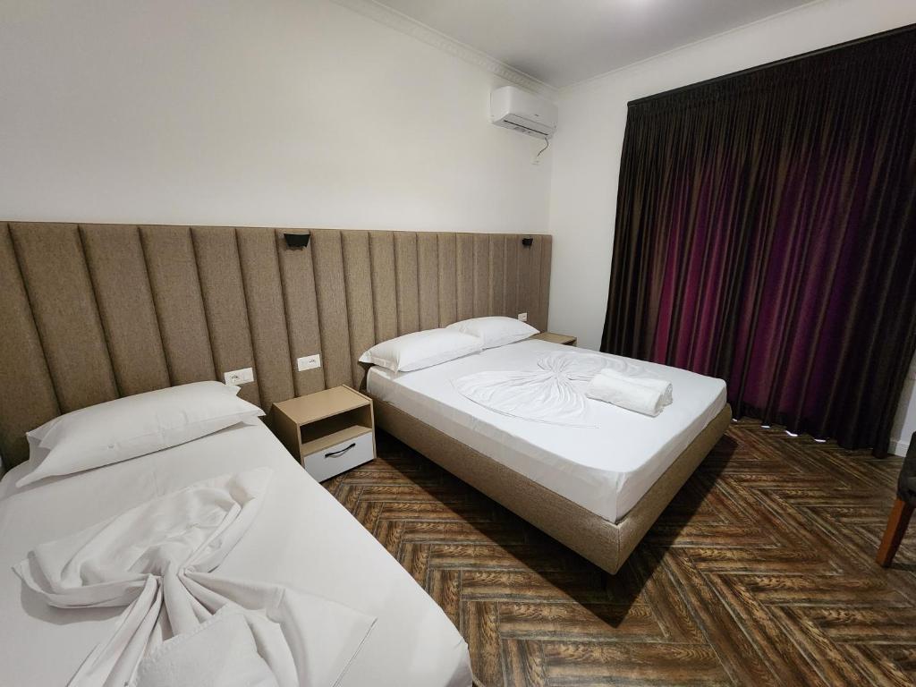 Postel nebo postele na pokoji v ubytování Villa AX Mirage