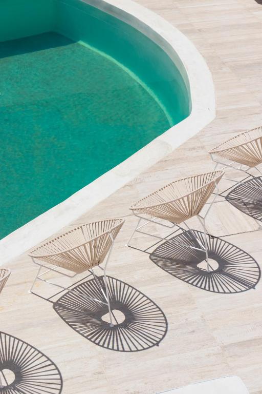 Bazén v ubytování Cavo Bianco Boutique Hotel & Spa nebo v jeho okolí