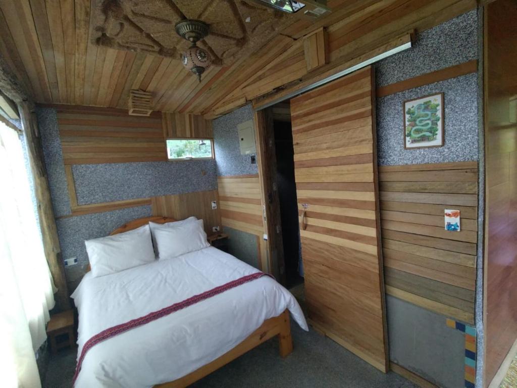 Postel nebo postele na pokoji v ubytování Mamallacta Páramo Lodge