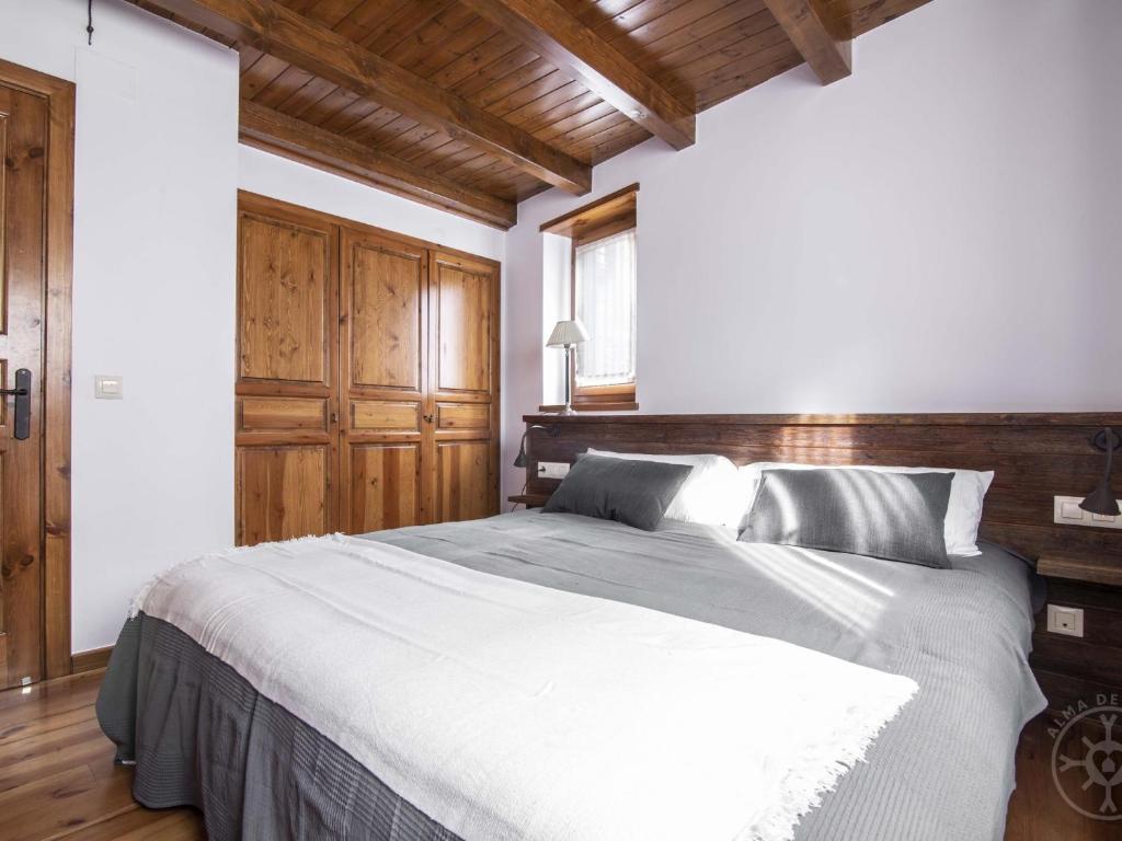 Postel nebo postele na pokoji v ubytování CASA REINA de Alma de Nieve