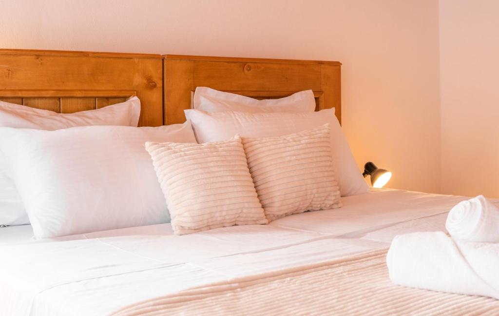 Uma cama ou camas num quarto em Porta7 Hotel