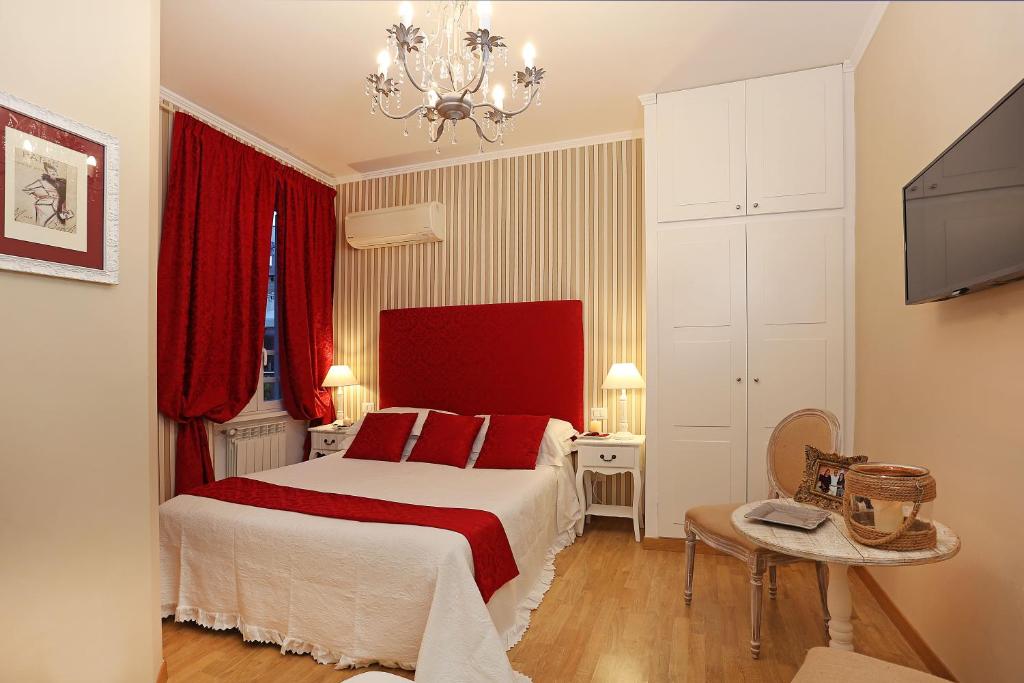 Łóżko lub łóżka w pokoju w obiekcie Daplace - HQH Colosseo