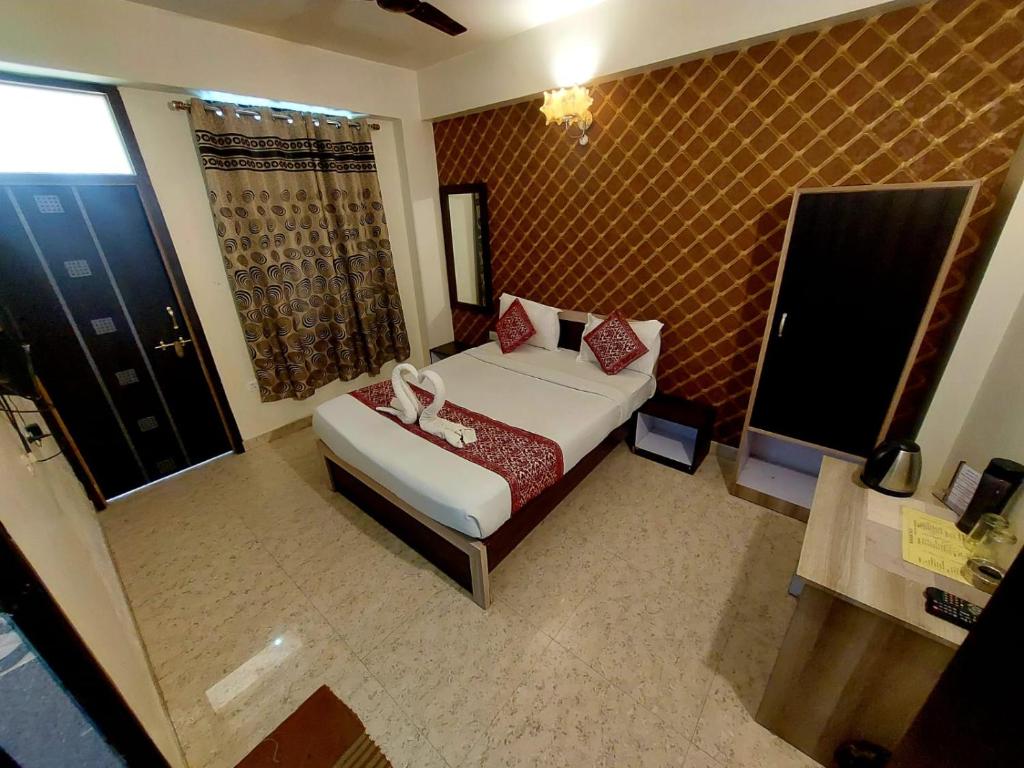 Postel nebo postele na pokoji v ubytování Hotel deep