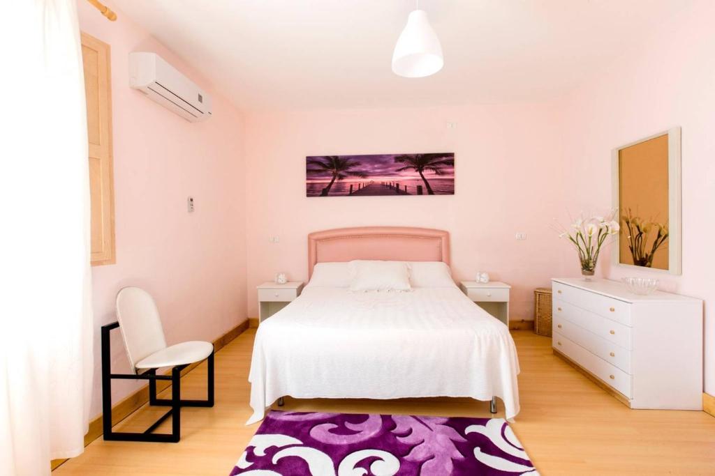 Łóżko lub łóżka w pokoju w obiekcie Baglio Sciacca - Xenia Sicily Villas