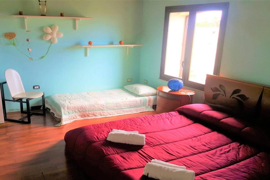 Łóżko lub łóżka w pokoju w obiekcie Baglio Sciacca - Xenia Sicily Villas