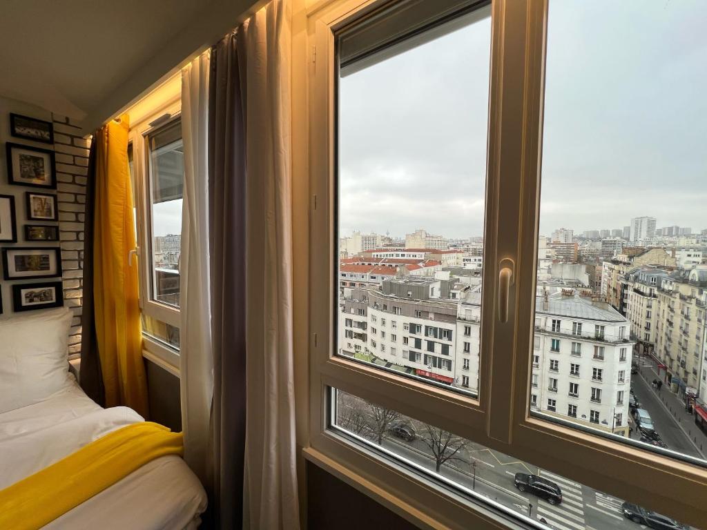 Posteľ alebo postele v izbe v ubytovaní Appartement Flandre