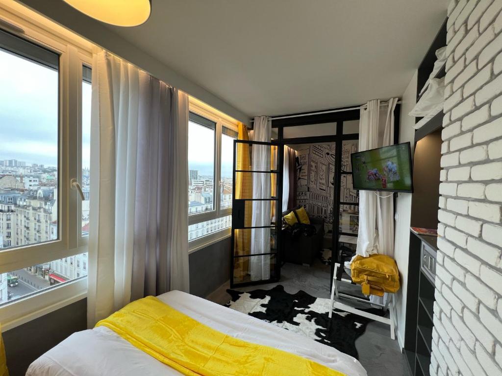 Posteľ alebo postele v izbe v ubytovaní Appartement Flandre