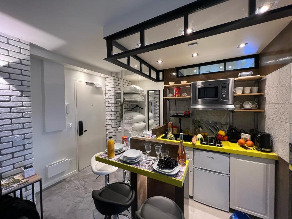 Kuchyňa alebo kuchynka v ubytovaní Appartement Flandre