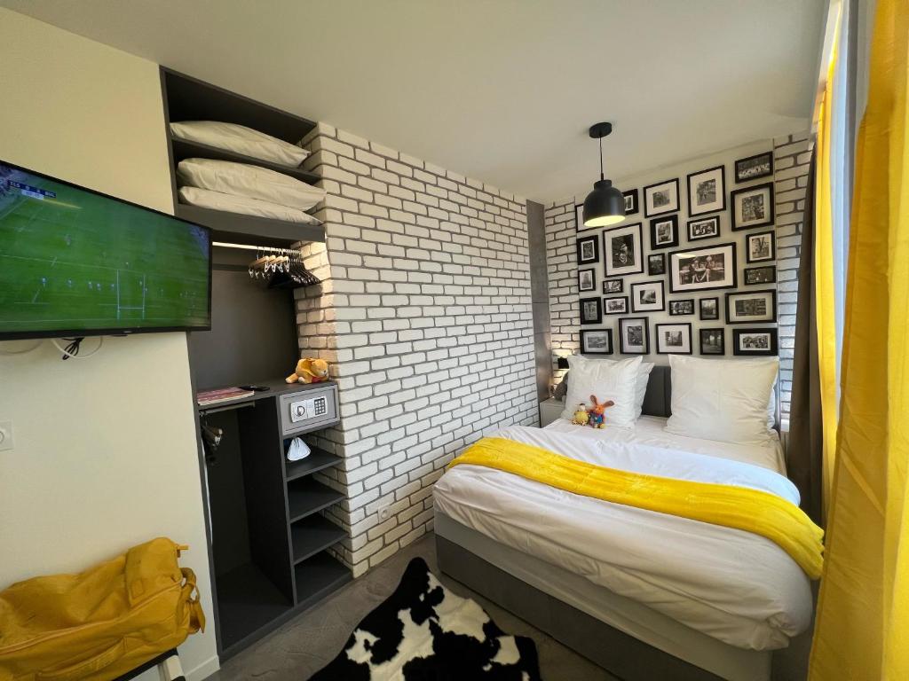 Posteľ alebo postele v izbe v ubytovaní Appartement Flandre