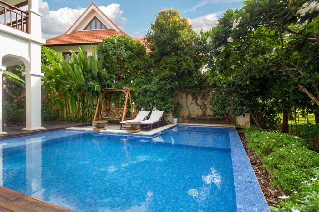 Bazén v ubytování Danang Pool Villas Resort & Spa My Khe Beach nebo v jeho okolí