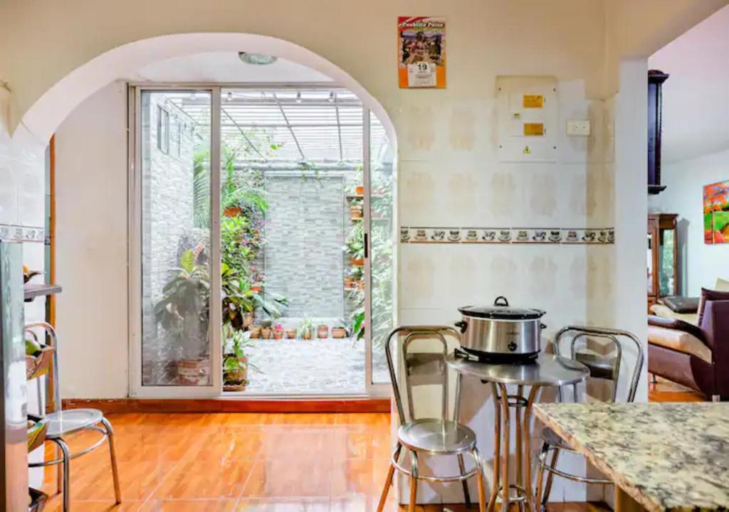 Posezení v ubytování Noras Homestay Laureles