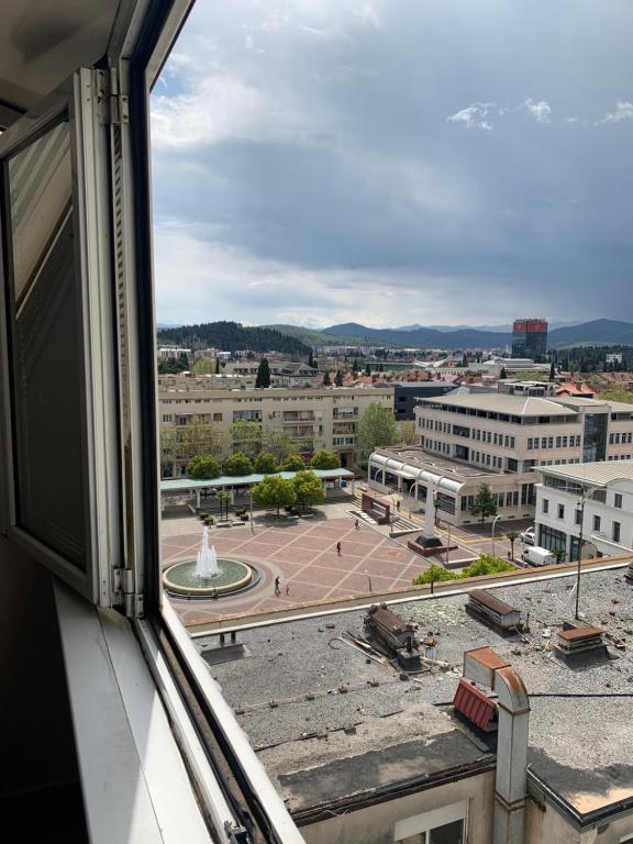 a view of a city from a window at Stan u strogom centru grada in Podgorica