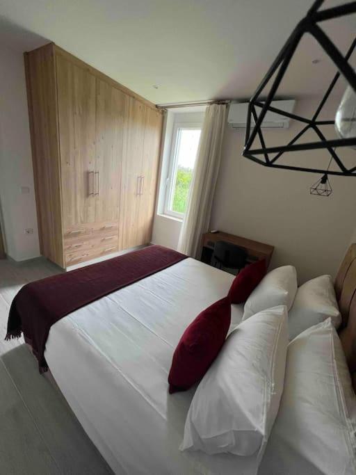 Postel nebo postele na pokoji v ubytování CARA Creta Home