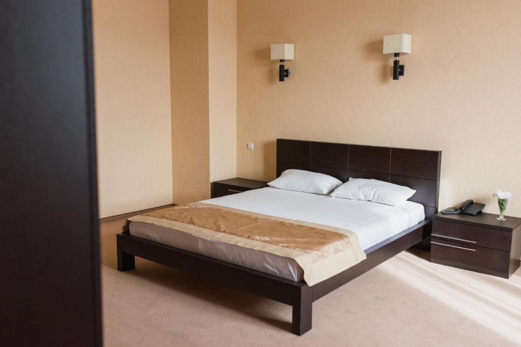 Postel nebo postele na pokoji v ubytování Ruta Resort Polyana