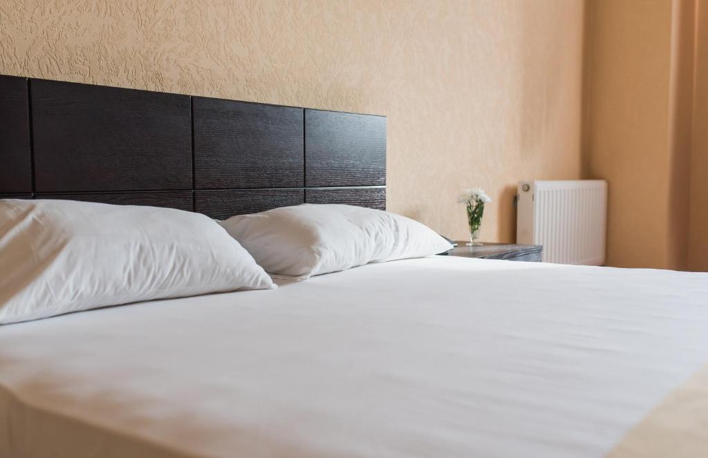 Postel nebo postele na pokoji v ubytování Ruta Resort Polyana