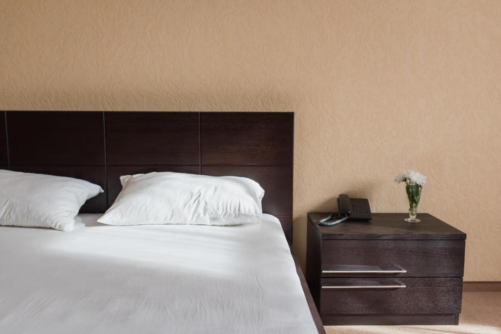 Postel nebo postele na pokoji v ubytování Ruta Resort Polyana