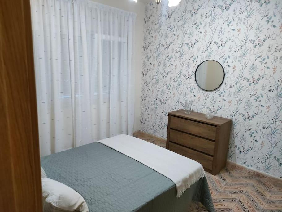 Posteľ alebo postele v izbe v ubytovaní Piso centrico en Ribadeo