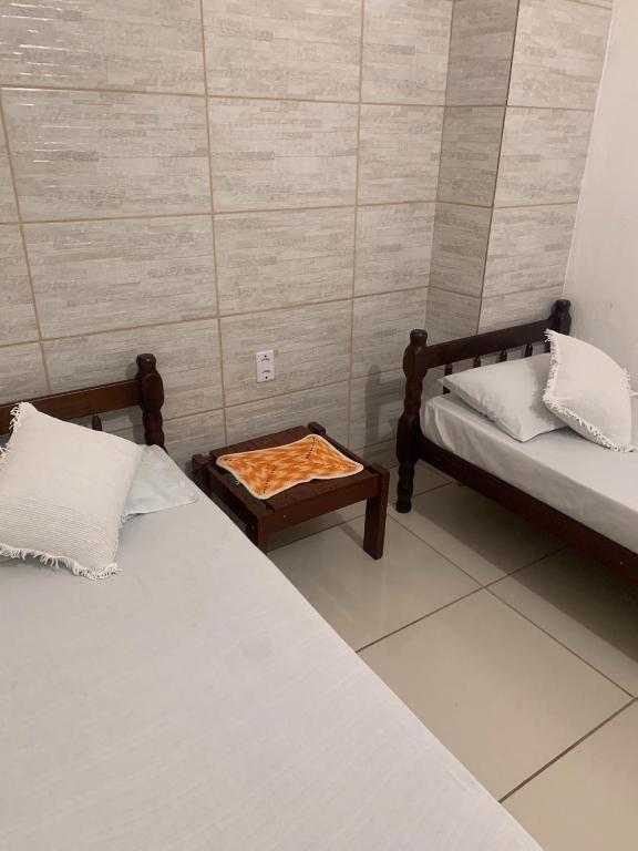 Postel nebo postele na pokoji v ubytování Hotel Pousada AngraAntiga