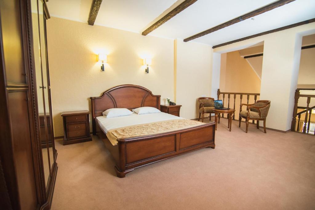 Postel nebo postele na pokoji v ubytování Ruta Resort Polyana