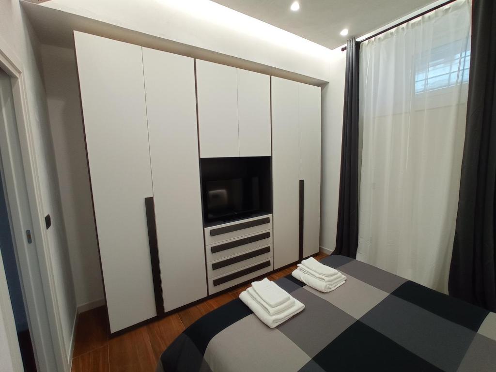 Postel nebo postele na pokoji v ubytování Suites Elifani