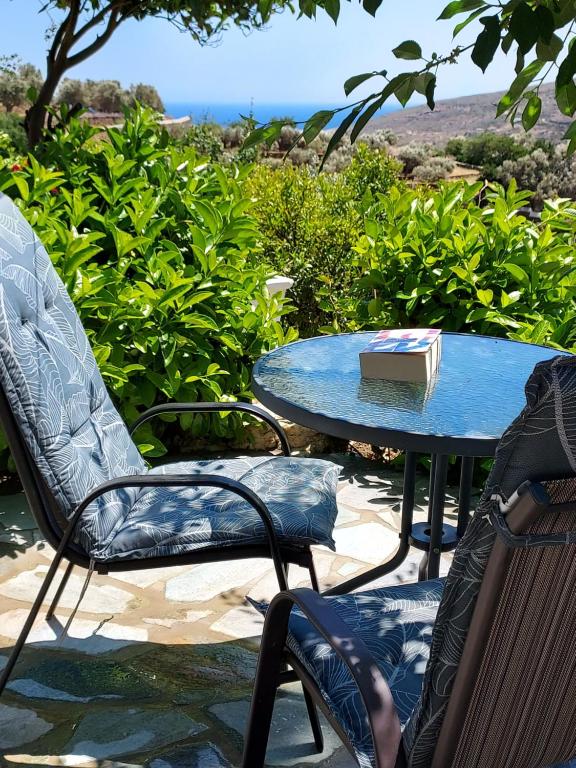 a blue table and chairs with a box on it at Green Oasis 3 in Lámira