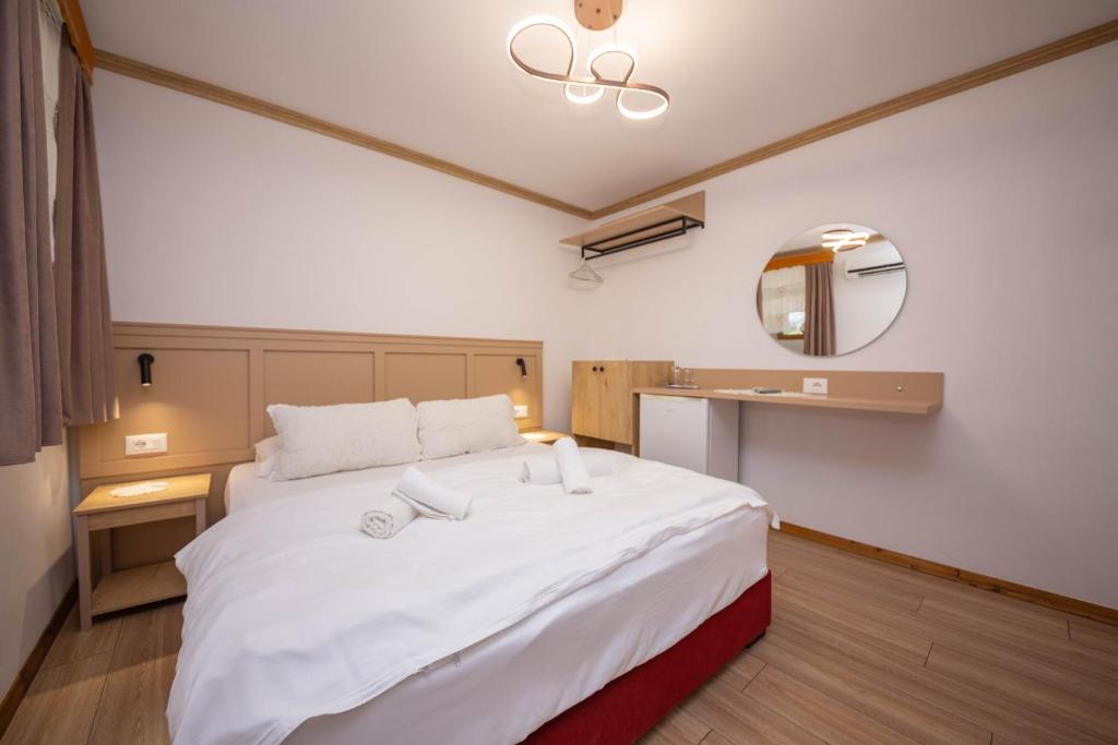 Postel nebo postele na pokoji v ubytování Bed and Breakfast Kotoni