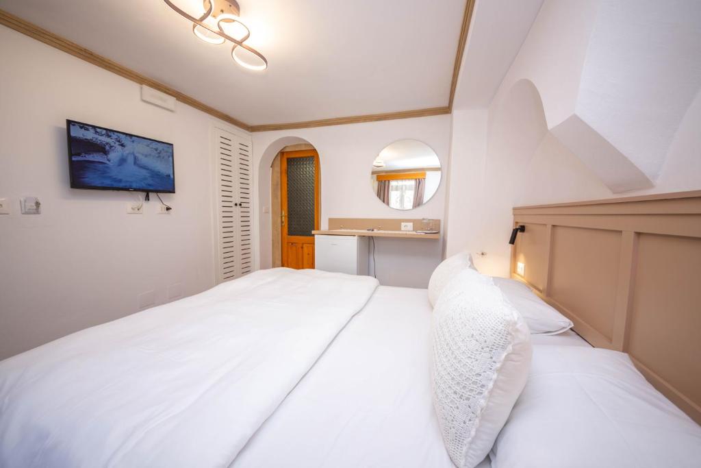 Postel nebo postele na pokoji v ubytování Bed and Breakfast Kotoni