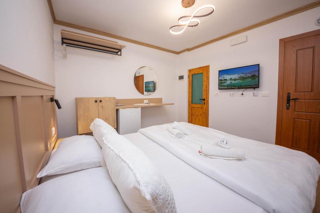 Postel nebo postele na pokoji v ubytování Bed and Breakfast Kotoni