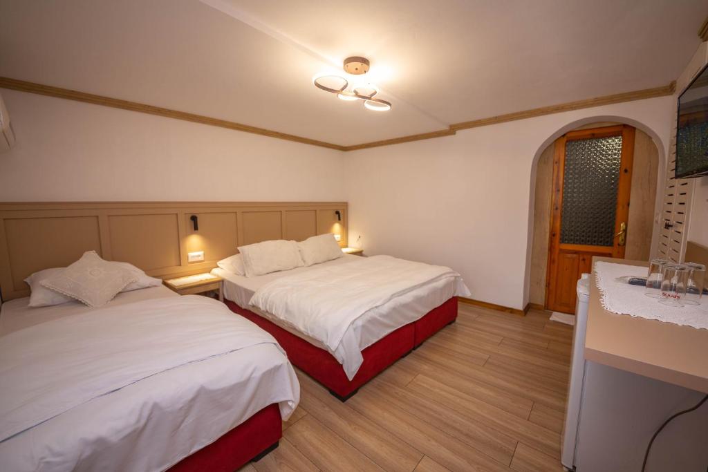Postel nebo postele na pokoji v ubytování Bed and Breakfast Kotoni