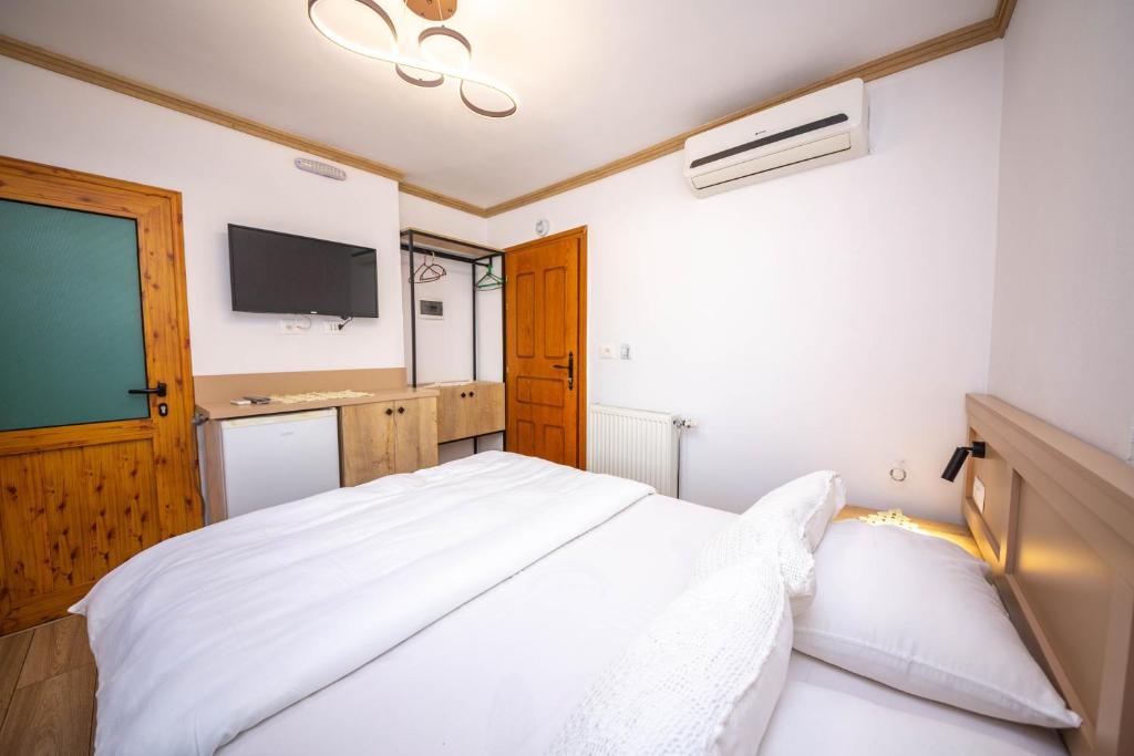 Postel nebo postele na pokoji v ubytování Bed and Breakfast Kotoni