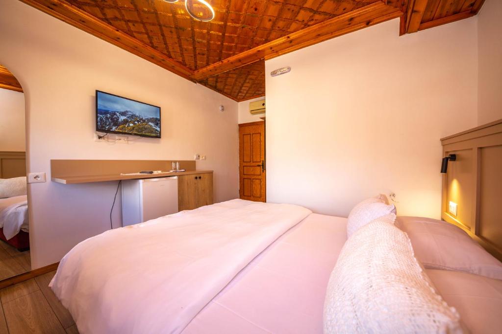 Postel nebo postele na pokoji v ubytování Bed and Breakfast Kotoni