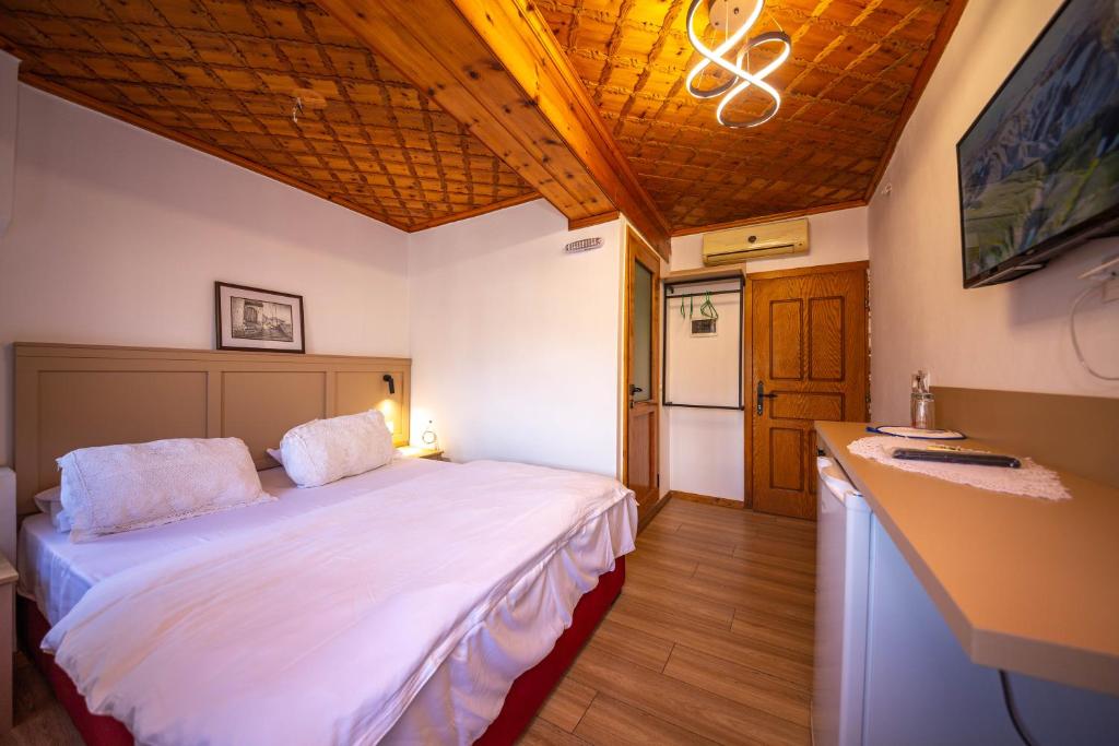 Postel nebo postele na pokoji v ubytování Bed and Breakfast Kotoni